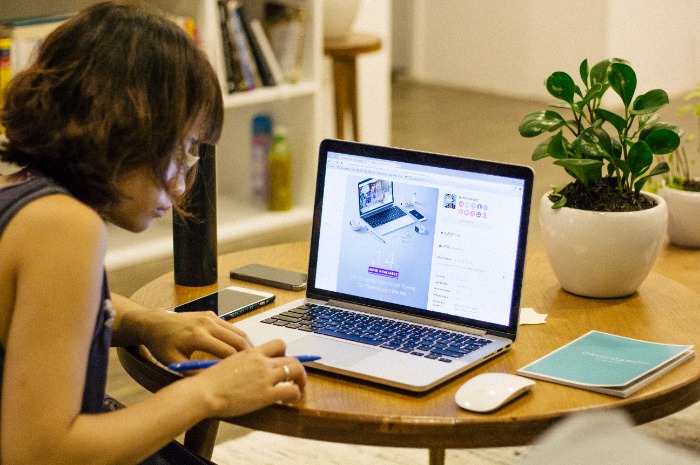 woman learning at laptop